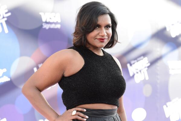 FILE - In this Monday, June 8, 2015 file photo, Mindy Kaling attends the Los Angeles premiere of  "Inside Out" at the El Capitan Theatre in Los Angeles. Kaling agreed to voice a character in Pixar’s latest film based on nothing more than an illustration. “They literally could have shown me nothing,” said Kaling, who plays a green, fluttery-lashed girl named Disgust in the new film “Inside Out.” She heard the word “Pixar,” and she was in.  (Photo by Dan Steinberg/Invision/AP, File)