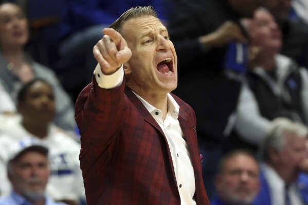 Alabama head coach Nate Oats directs his team during the second half of an NCAA college basketball game against Kentucky, Saturday, Feb. 24, 2024, in Lexington, Ky. (AP Photo/James Crisp)
