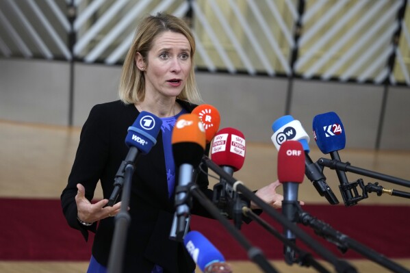 Estonia's Prime Minister Kaja Kallas speaks with the media as she arrives for an EU summit at the European Council building in Brussels, Thursday, Oct. 26, 2023. European Union leaders gather Thursday for a two day meeting to discuss, among other issues, Ukraine and the impact of the war between Israel and Hamas. (AP Photo/Virginia Mayo)