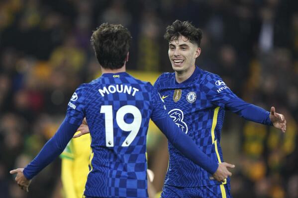 Chelsea's Kai Havertz, right, celebrates scoring during the English Premier League soccer match between Norwich City and Chelsea at Carrow Road, Norwich, England, Thursday, March 10, 2022. (Joe Giddens/PA via AP)