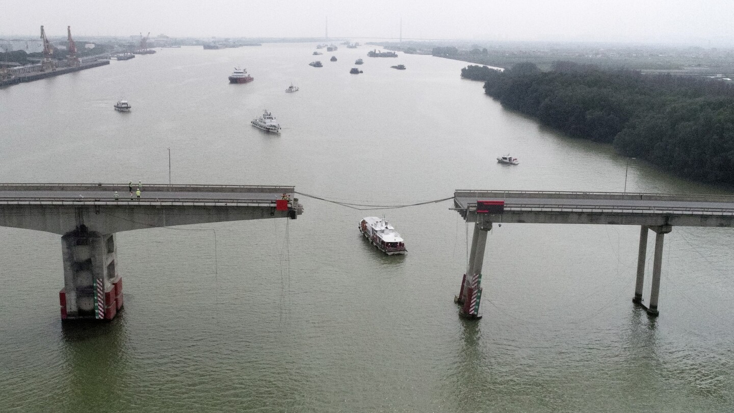 Container ship hits bridge in south China, killing 5 and knocking