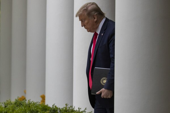 President Donald Trump arrives to speak about the coronavirus in the Rose Garden of the White House, Tuesday, April 14, 2020, in Washington. (AP Photo/Alex Brandon)