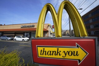 FILE - An exit sign is shown at a McDonald's restaurant in Pittsburgh, April 23, 2022. McDonald's reports earnings on Monday Oct. 30, 2023. (AP Photo/Gene J. Puskar, File)