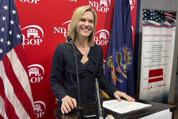 North Dakota Republican Public Service Commissioner Julie Fedorchak steps up to a lectern to announce her U.S. House candidacy at Republican Party headquarters in Bismarck, N.D., Thursday, Feb. 15, 2024. Fedorchak has served on the state's Public Service Commission since 2013. She is the third Republican to announce a campaign for North Dakota's single House seat. Republican Rep. Kelly Armstrong, first elected in 2018, is running for governor, creating an open race for the seat. (AP Photo/Jack Dura)