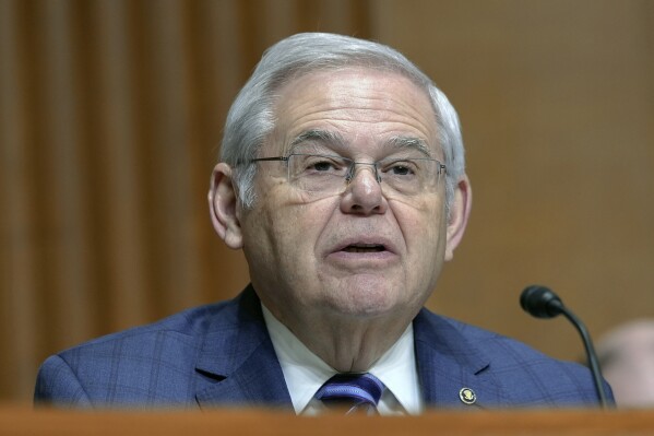 FILE - Sen. Bob Menendez, D-N.J., asks a question during a Senate Finance Committee hearing on Capitol Hill Thursday, March 14, 2024, in Washington. For the second time in a decade, U.S. Sen. Bob Menendez faces a corruption trial Monday with his political career and freedom on the line in a criminal case that has already forced him out of one of the most powerful posts in Congress. (AP Photo/Mariam Zuhaib, File)