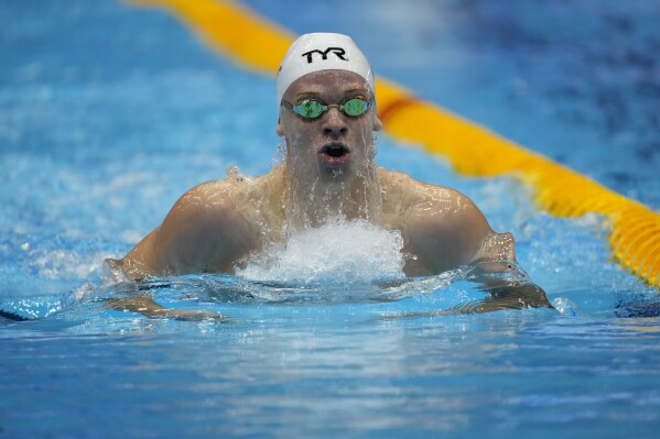 French swimmer Marchand obliterates Phelps' world record