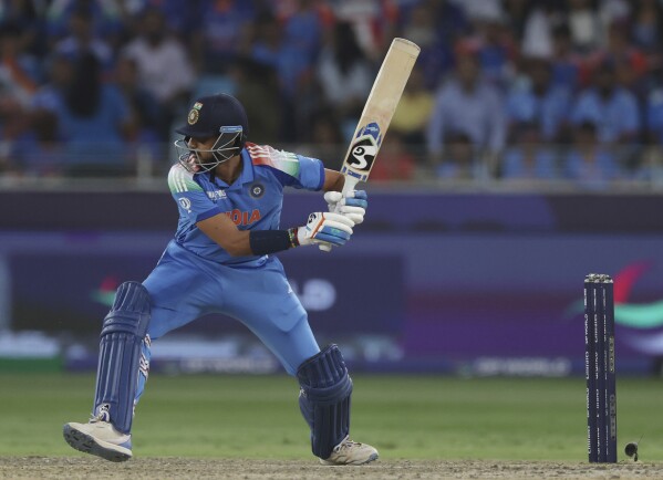 India's Axar Patel plays a shot during the ICC Champions Trophy semifinal cricket match between India and Australia at Dubai International Cricket Stadium in Dubai, United Arab Emirates, Tuesday, March 4, 2025. (AP Photo/Christopher Pike)