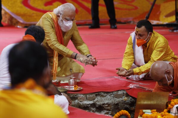 Indian Prime Minister Narendra Modi performs the groundbreaking ceremony of a temple dedicated to the Hindu god Ram, in Ayodhya, India, Aug. 5, 2020. (AP Photo/Rajesh Kumar Singh, File)