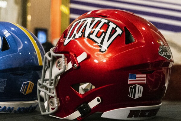 A UNLV helmet is displayed during the Moutain West Conference NCAA college football media days at Circa resort and casino in Las Vegas, July 19, 2023. (Bizuayehu Tesfaye/Las Vegas Review-Journal via AP, File)