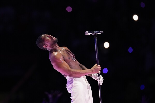 Usher performs during halftime of the NFL Super Bowl 58 football game between the San Francisco 49ers and the Kansas City Chiefs on Sunday, Feb. 11, 2024, in Las Vegas. (AP Photo/Eric Gay)