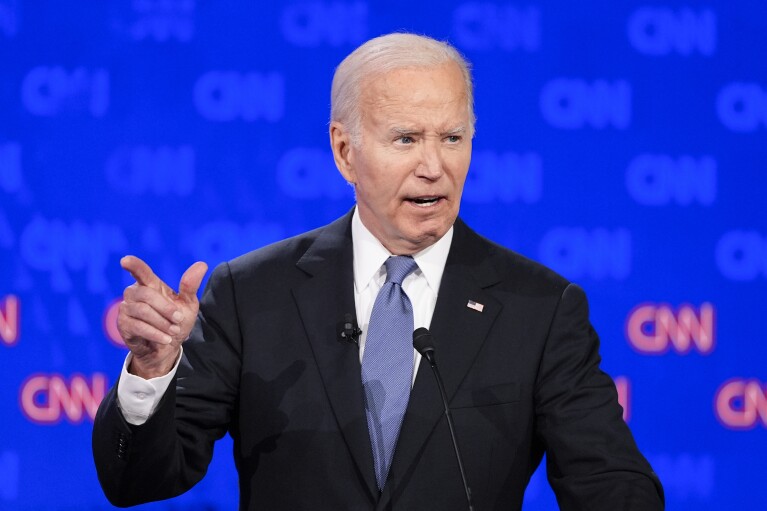 President Joe Biden gestures during a presidential debate with Republican presidential candidate former President Donald Trump, Thursday, June 27, 2024, in Atlanta. (AP Photo/Gerald Herbert)