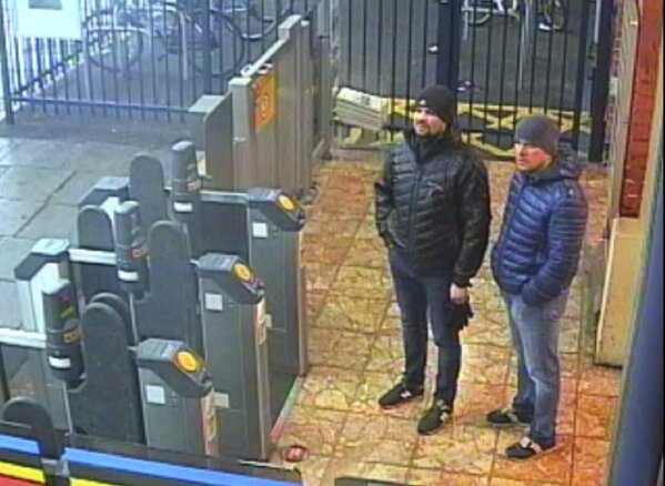 
              This still taken from CCTV and issued by the Metropolitan Police in London on Wednesday Sept. 5, 2018, shows Ruslan Boshirov and Alexander Petrov at Salisbury train station on March 3, 2018. British prosecutors have charged two Russian men, Alexander Petrov and Ruslan Boshirov, with the nerve agent poisoning of ex-spy Sergei Skripal and his daughter Yulia in the English city of Salisbury. They are charged in absentia with conspiracy to murder, attempted murder and use of the nerve agent Novichok. (Metropolitan Police via AP)
            