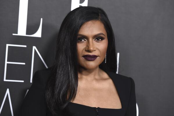 FILE - Mindy Kaling arrives at the 29th annual ELLE Women in Hollywood Celebration in Los Angeles on Oct. 17, 2022. Kaling is set to receive the Norman Lear Achievement Award from the Producers Guild of America at the group’s awards show in February. The guild on Wednesday cited Kaling's ability to “break boundaries and push culture forward” through her television projects. (Photo by Jordan Strauss/Invision/AP, File)