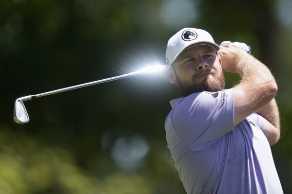 Tyrrell Hatton, of England, watches his tee shot on the fourth hole during final round at the Masters golf tournament at Augusta National Golf Club Sunday, April 14, 2024, in Augusta, Ga. (AP Photo/Ashley Landis)