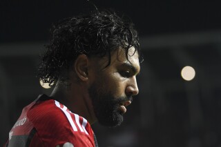FILE - Gabriel Barbosa of Brazil's Flamengo stands on the pitch during a Copa Libertadores group A soccer match against Argentina's Racing Club at Presidente Peron stadium in Avellaneda, Argentina, May 4, 2023. Barbosa was suspended for two years on March 25, 2024 following a doping fraud investigation. (AP Photo/Gustavo Garello, File)