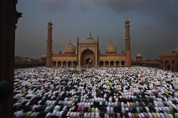 Muslims offer prayers at a mosque in New Delhi, India, Thursday, April 11, 2024. In the mid-1980s, Muslims accounted for 11% of India's population, and had 9% of seats in Parliament; today they are 14% of the population and control about 4.6% of Parliament. (AP Photo/Manish Swarup)