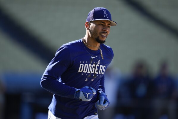 Los Angeles Dodgers' Mookie Betts participates in batting practice before Game 1 of a baseball NL Division Series game against the Arizona Diamondbacks in Los Angeles, Saturday, Oct. 7, 2023. (AP Photo/Ashley Landis)