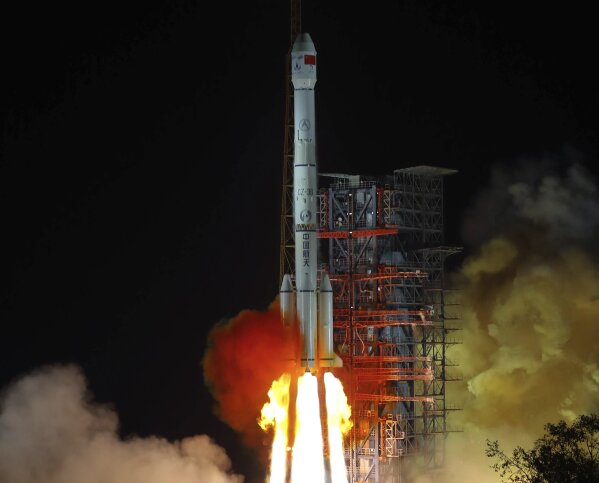 
              FILE - In this Dec. 8, 2018, file photo, and released by Xinhua News Agency, the Chang'e 4 lunar probe launches from the the Xichang Satellite Launch Center in southwestern China's Sichuan province. The official China Central Television says Thursday, Jan. 3, 2019, the lunar explorer Chang'e 4 had touched down at 10:26 a.m to make first-ever landing on the far side of the moon. (Jiang Hongjing/Xinhua via AP, File)
            