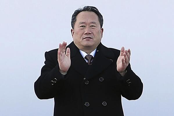 FILE - In this Dec. 26, 2018, file photo, North Korean Ri Son Gwon, center, chairman of the North Korean agency that handles inter-Korean affairs, applauses with South Korean officials during a groundbreaking ceremony at Panmun Station in Kaesong, North Korea. Ri on  Wednesday, June 23, 2021, reiterated the North Korea's stance that it has no immediate intention to resume stalled nuclear talks with the United States, dismissing hopes expressed by U.S. and South Korean officials for a quick resumption of negotiations. (Korea Pool/Newsis via AP)