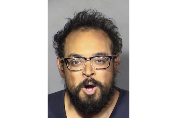 This Tuesday, June 13, 2023, booking photo provided by the Las Vegas Metropolitan Police Department shows Matthew DeSavio. Authorities say DeSavio was arrested that day after allegedly making threats to carry out a mass shooting at Game 5 of the Stanley Cup Final on the Las Vegas Strip. (Las Vegas Metropolitan Police Department via AP)
