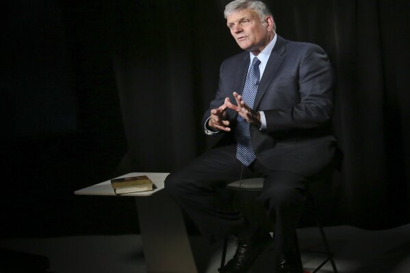 
              In this May 1, 2018, photo, the Rev. Franklin Graham speaks during an interview about his latest book "Through my Father's Eyes," about his father the late evangelist Billy Graham in New York. Billy Graham's oldest son, Franklin, says his new book about his father is meant to share lessons he learned from the man known as "America's Pastor." (AP Photo/Bebeto Matthews)
            