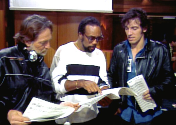 This image released by Netflix shows Willie Nelson, from left, Quincy Jones and Bruce Springsteen in a scene from "The Greatest Night in Pop." (Netflix via AP)