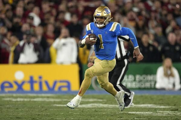 UCLA quarterback Dorian Thompson-Robinson runs the ball during the second half of an NCAA college football game against Southern California Saturday, Nov. 19, 2022, in Pasadena, Calif. (AP Photo/Mark J. Terrill)