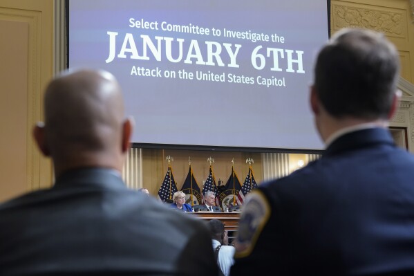 U.S. Capitol Police Sgt. Aquilino Gonell, left, and Washington Metropolitan Police Department officer Daniel Hodges listen as the House select committee investigating the Jan. 6 attack on the U.S. Capitol holds a hearing on Capitol Hill in Washington, Oct. 13, 2022. (AP Photo/Jacquelyn Martin, File)