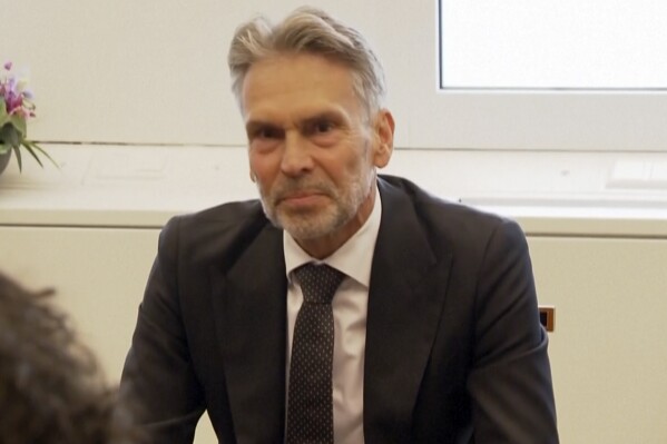 In this image taken from video, Dick Schoof attends a meeting in The Hague, Netherlands, Tuesday, May 28, 2024. A former head of the Dutch spy agency and counterterrorism office was tipped Tuesday to become the Netherlands' next prime minister, leading a four-party coalition headed by Geert Wilders' hard right Party for Freedom. Dick Schoof, the 67-year-old former head of the General Intelligence and Security Service and currently the top civil servant at the Ministry of Security and Justice, was meeting with the leaders of the four parties and was expected to be announced as their choice to become prime minister at a late afternoon press conference. (RTL Nieuws via AP)
