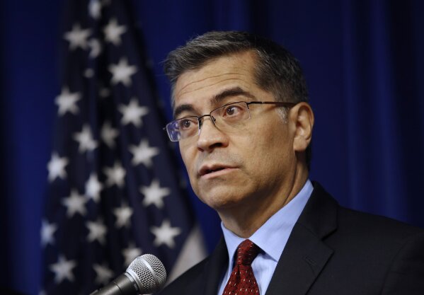 FILE - In this Dec. 4, 2019, file photo, California Attorney General Xavier Becerra speaks during a news conference in Sacramento, Calif. President-elect Joe Biden has picked Becerra to be his health secretary, putting a defender of the Affordable Care Act in a leading role to oversee his administration’s coronavirus response. (AP Photo/Rich Pedroncelli, File)