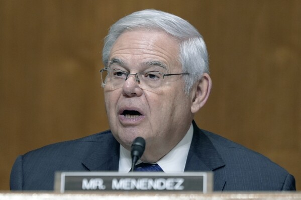 FILE - Sen. Bob Menendez, D-N.J., talks at the Senate Finance hearing on Capitol Hill Thursday, March 21, 2024. in Washington. Jury selection is scheduled to start Monday, May 13, 2024, in the trial of Menendez, a Democrat charged with accepting bribes of gold and cash to use his influence to aid three New Jersey businessmen. (AP Photo/Mariam Zuhaib, File)