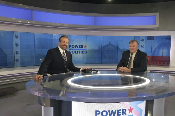 In this undated photo provided by Alex Zdan, former News 12 reporter Alex Zdan, left, is seen in the studio. Zdan launched a bid for the Republican nomination for U.S. Senate Friday, Feb. 9, 2024, focusing on the U.S.-Mexico border and calling for a new generation of conservative leaders. (Alex Zdan via AP)