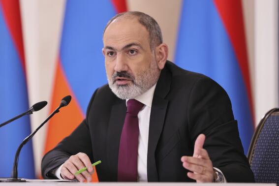 Armenian Prime Minister Nikol Pashinyan speaks during a news conference in Yerevan, Armenia, Tuesday, Jan. 10, 2023. Armenia's prime minister says his country has refused to host military drills planned by a Russia-dominated security pact. Pashinyan's announcement on Tuesday reflected Armenia's growing tensions with Moscow. (Tigran Mehrabyan, PAN Photo via AP)