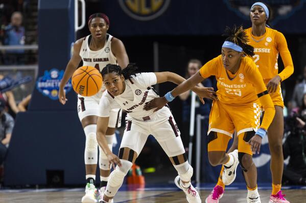 South Carolina's Zia Cooke (1) goes for a loose ball over Tennessee's Jordan Horston (25) in the first half of an NCAA college basketball game during the championship game of the Southeastern Conference women's tournament in Greenville, S.C., Sunday, March 5, 2023. (AP Photo/Mic Smith)