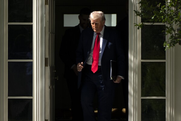 President Donald Trump arrives to welcome the Super Bowl champion Philadelphia Eagles NFL football team to the South Lawn of the White House, Monday, April 28, 2025, in Washington. (AP Photo/Mark Schiefelbein)