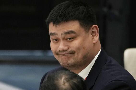 FILE - Former NBA basketball player Yao Ming attends a luncheon during the forum titled Chinese Modernization and the World held at The Grand Halls in Shanghai, on April 21, 2023. Yao has stepped down as head of China’s struggling national league. (AP Photo/Ng Han Guan, File)