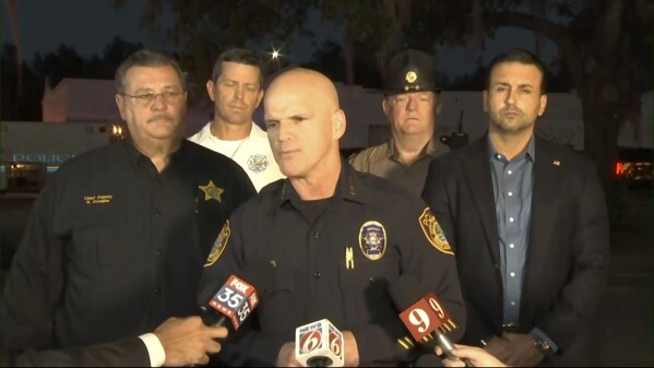 In this screengrab from video provided by WKMG/ClickOrlando, Ocala Police Chief Mike Balken speaks during a news conference following a fatal shooting in a common area at Paddock Mall in Ocala, Fla., located about 80 miles northwest of Orlando, Saturday, Dec. 23, 2023. (WKMG/ClickOrlando via AP)