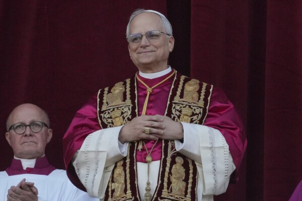 Newly elected Pope Leone XIV appears at the balcony of St. Peter's Basilica at the Vatican, Thursday, May 8, 2025. (AP Photo/Andrew Medichini)