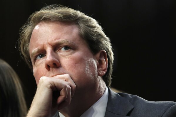 
              FILE - In this Sept. 4, 2018 file photo, White House counsel Don McGahn, listens as he attends a confirmation hearing for Supreme Court nominee Brett Kavanaugh before the Senate Judiciary Committee on Capitol Hill in Washington.  (AP Photo/Jacquelyn Martin)
            