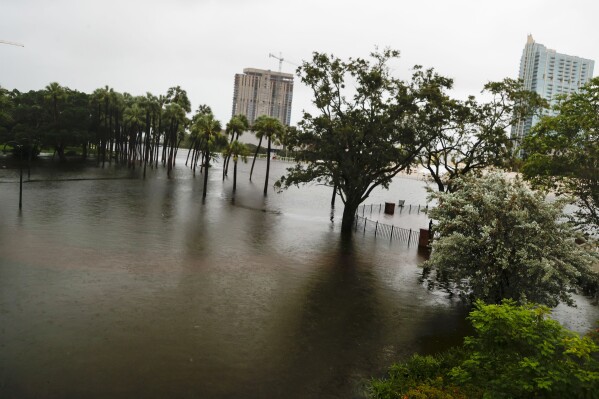 Water from the Hillsborough River rises onto Plant parkk at University of Tampa, Fla., in downtown as Hurricane Idalia approaches the Big Bend region on Wednesday, Aug. 30, 2023. (Ivy Ceballo/Tampa Bay Times via AP)