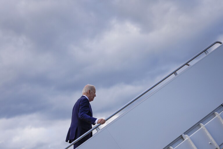 FILE - President Joe Biden boards Air Force One at Andrews Air Force Base, Md., April 12, 2024, enroute to New Castle, Del. The White House and the Democratic National Committee are splitting the cost of Biden’s travel while he runs for a second term. It’s part of a longstanding arrangement that prevents taxpayers from being stuck with the full bill for political trips. (AP Photo/Pablo Martinez Monsivais, File)