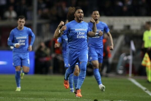 Marseille's Dimitri Payet celebrates after scoring the opening goal of his team during the Europa Conference League, second leg, quarterfinal soccer match between PAOK FC and Olympique Marseille at the Toumba stadium in the northern city of Thessaloniki, Greece, Thursday, April 14, 2022. (AP Photo/Giannis Papanikos)