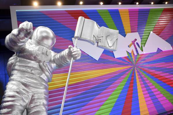 In this Aug. 20, 2018, file photo, an MTV statue appears on the red carpet at the MTV Video Music Awards at Radio City Music Hall in New York. MTV is marking its 40th anniversary with a relaunch of its iconic image of an astronaut on the moon, with an MTV flag planted nearby. On Sunday, Aug. 1, 2021 the video channel unveiled a large scale “Moon Person" during a ceremony at NASA's Kennedy Space Center in Cape Canaveral, Florida. (Photo by Evan Agostini/Invision/AP, File)
