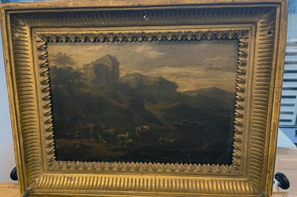 This photo shows the 18th century painting titled "Landscape of Italian Character" by Vienna-born artist Johann Franz Nepomuk Lauterer, Thursday, Oct. 19, 2023 in Chicago. After going missing nearly 80 years ago, the "Landscape of Italian Character", a baroque landscape painting was returned to a German museum representative in a brief ceremony at the German Consulate in Chicago, where the pastoral piece of an Italian countryside was on display. (AP Photo/Claire Savage)