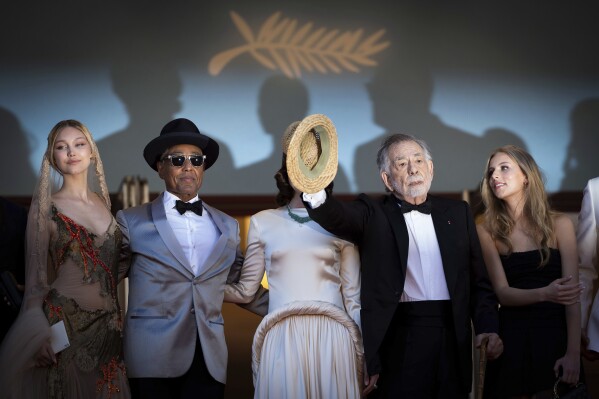 Grace VanderWaal, from left, Giancarlo Esposito, Aubrey Plaza, director Francis Ford Coppola, and Romy Mars pose for photographers upon arrival at the premiere of the film 'Megalopolis' at the 77th international film festival, Cannes, southern France, Thursday, May 16, 2024. (Photo by Scott A Garfitt/Invision/AP)