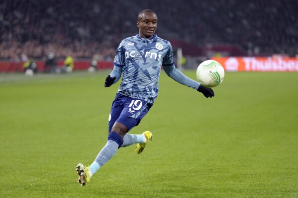 Aston Villa's Moussa Diaby runs after the ball during the Europa Conference League round of 16 first leg soccer match between Ajax and Aston Villa at Johan Cruyff ArenA stadium in Amsterdam, Netherlands, Thursday, March 7, 2024. (AP Photo/Peter Dejong)