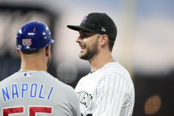 Yan Gomes' clutch hit lifts Cubs over Rockies