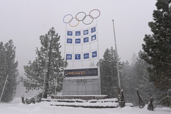 FILE - The entrance to Palisades Tahoe is shown in Olympic Valley, Calif., on Jan. 10, 2024. An alleged carjacking suspect was fatally shot by police Friday, Jan. 26, 2024, at a California ski resort near Lake Tahoe, authorities said. The shooting occurred near an event center that often hosts weddings at Palisades Tahoe, according to the California State Parks. (AP Photo/Andy Barron, File)