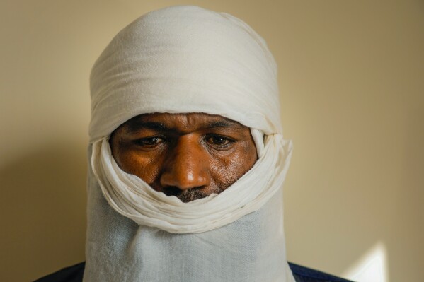 Mouhamadou Ibrahim, a former jihadi commander who decided to defect, poses for a photograph in Niamey, Niger, Friday, Aug. 18, 2023. The future of a program in Niger that encourages jihadi fighters to defect and reintegrate into society is unclear after mutinous soldiers toppled the government that launched it. (AP Photo/Sam Mednick)