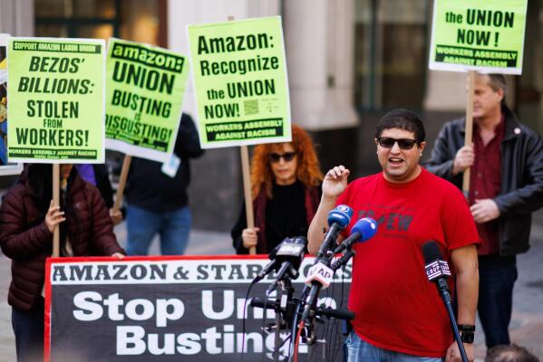 FILE - Amazon JFK8 distribution center union organizer Jason Anthony speaks to media, April 1, 2022, in the Brooklyn borough of New York. The U.S. union membership rate reached an all-time low in 2022, despite high-profile unionization campaigns at Starbucks, Amazon and other companies. Union members fell to 10.1% of the overall workforce, according to the U.S. Bureau of Labor Statistics. That was down slightly from 10.3% in 2021. (AP Photo/Eduardo Munoz Alvarez, File)